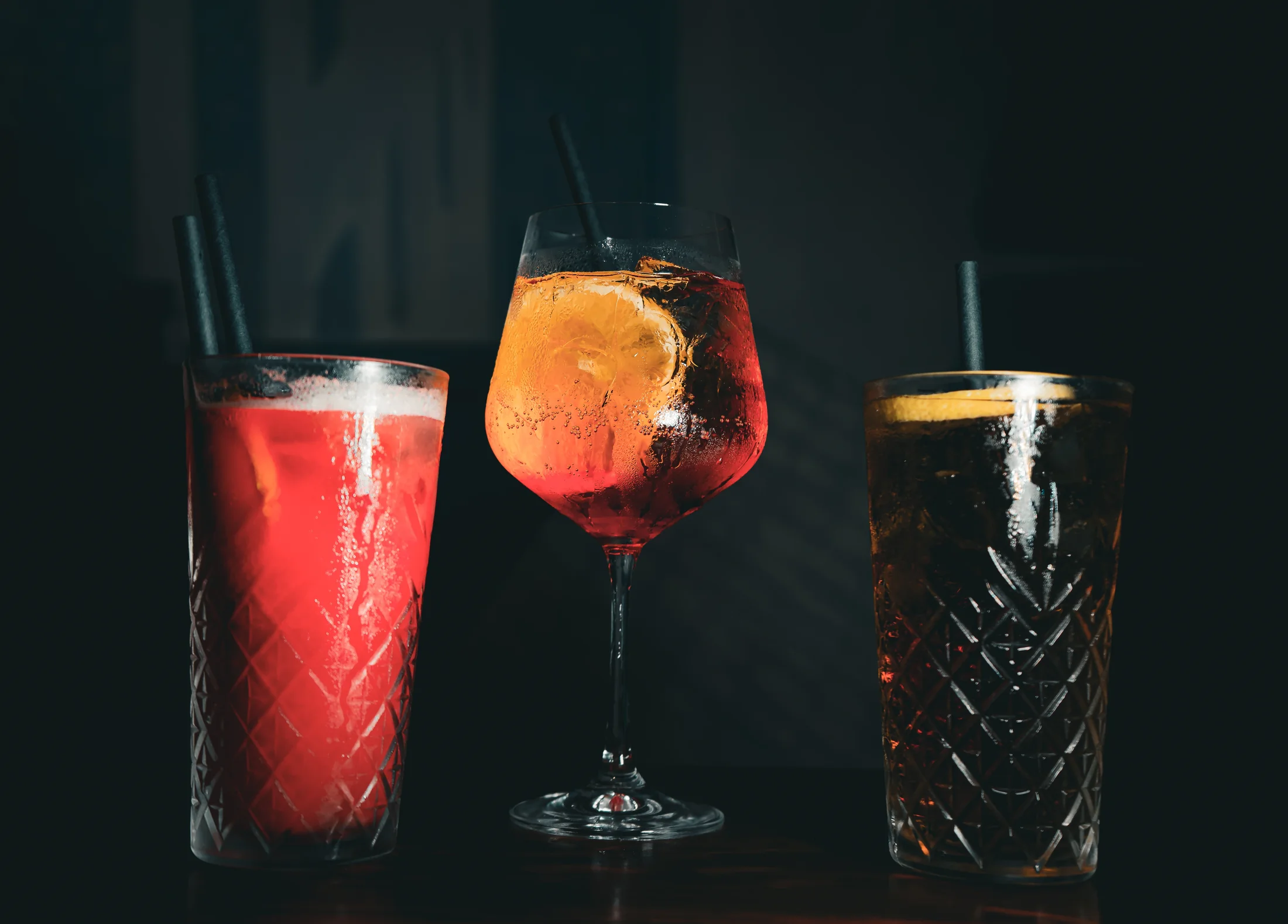 Colourful cocktails against the Fox Bros after-dark setting