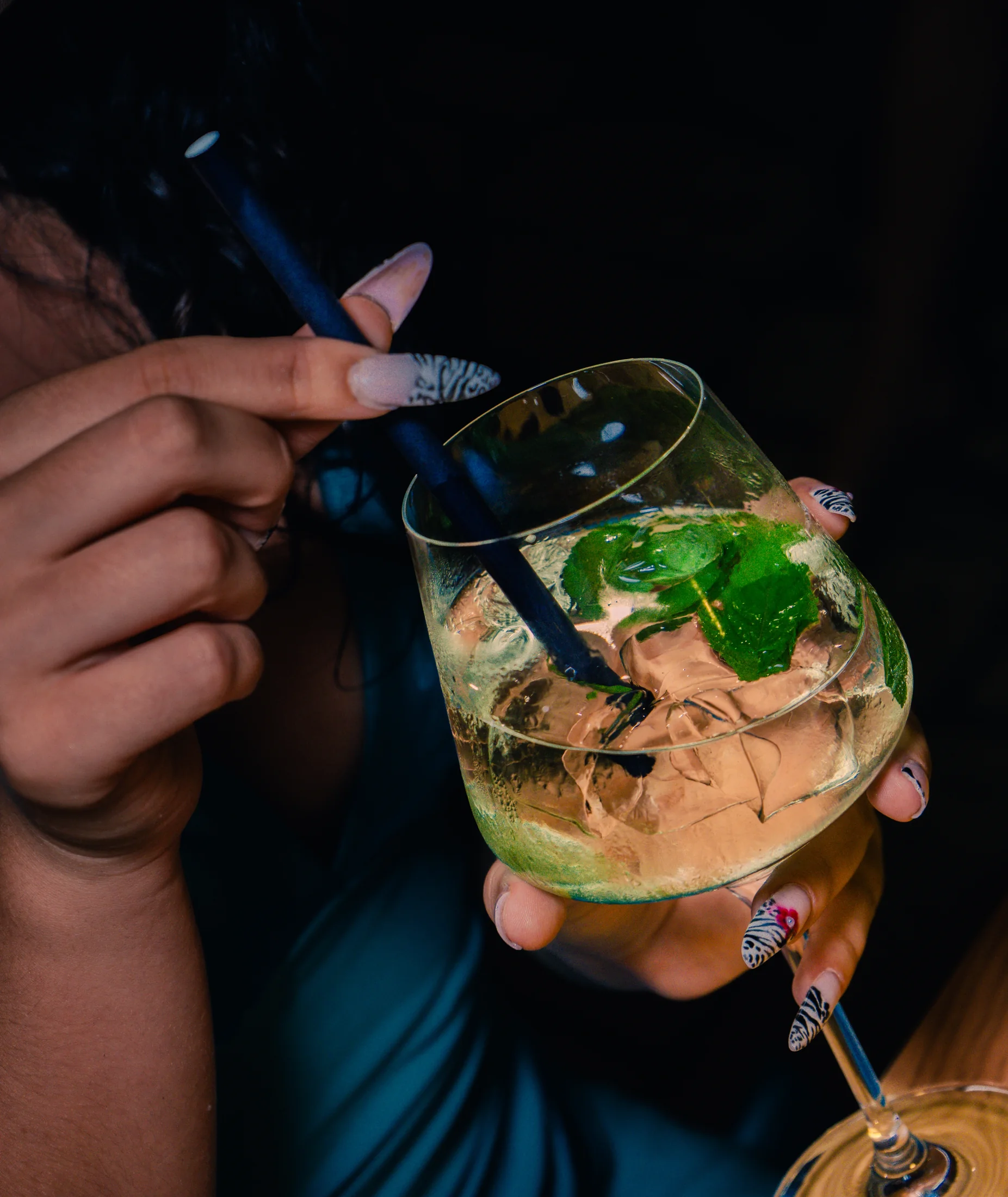 A fresh cocktail finished with herbs